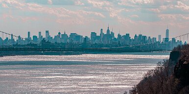 manhattan-skyline Manhattan view through the G.W Bridge from the Palisades Parkway overlook in NJ